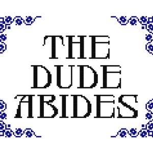 May include: A black and white image with a blue border. The text "THE DUDE ABIDES" is centred in the image.
