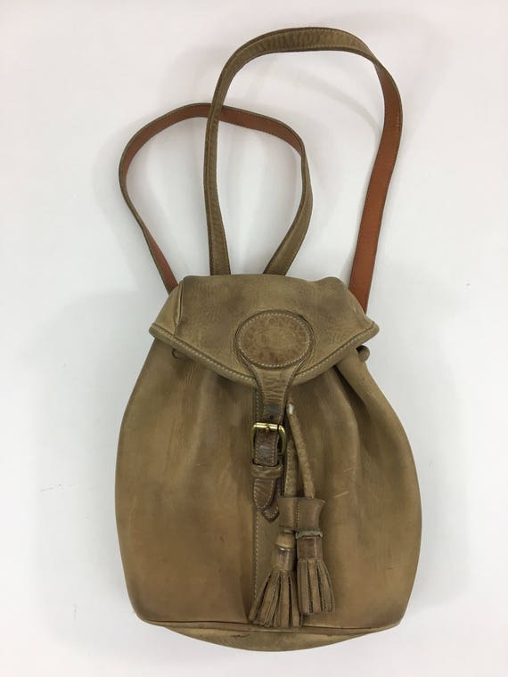 Vintage Dooney \u0026 Bourke Leather Backpack Bag Purse Brass Hardware Tassel Drawstring Tan