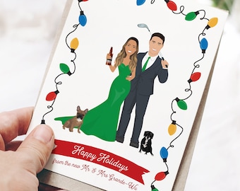 Couple holiday cards with Christmas lights, Personalized cartoon portrait of couple with dogs, Custom Christmas cards for newlyweds