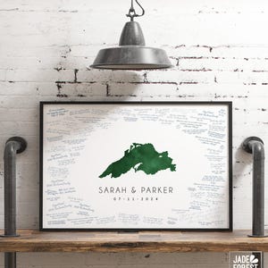 May include: A white ceramic mug with a black handle and the text "But First, Coffee" in a black, handwritten-style font. The mug is on a white surface.