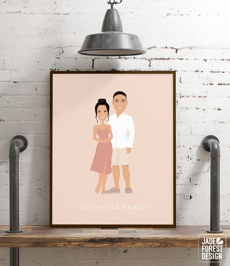 May include: A framed illustration of a couple, set against a pale pink background. The woman wears a pink dress, and the man is in a white shirt and shorts. The text "RODRIGUEZ FAMILY" is at the bottom. The artwork is displayed on a wooden shelf.