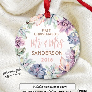 a christmas ornament with a floral design on it