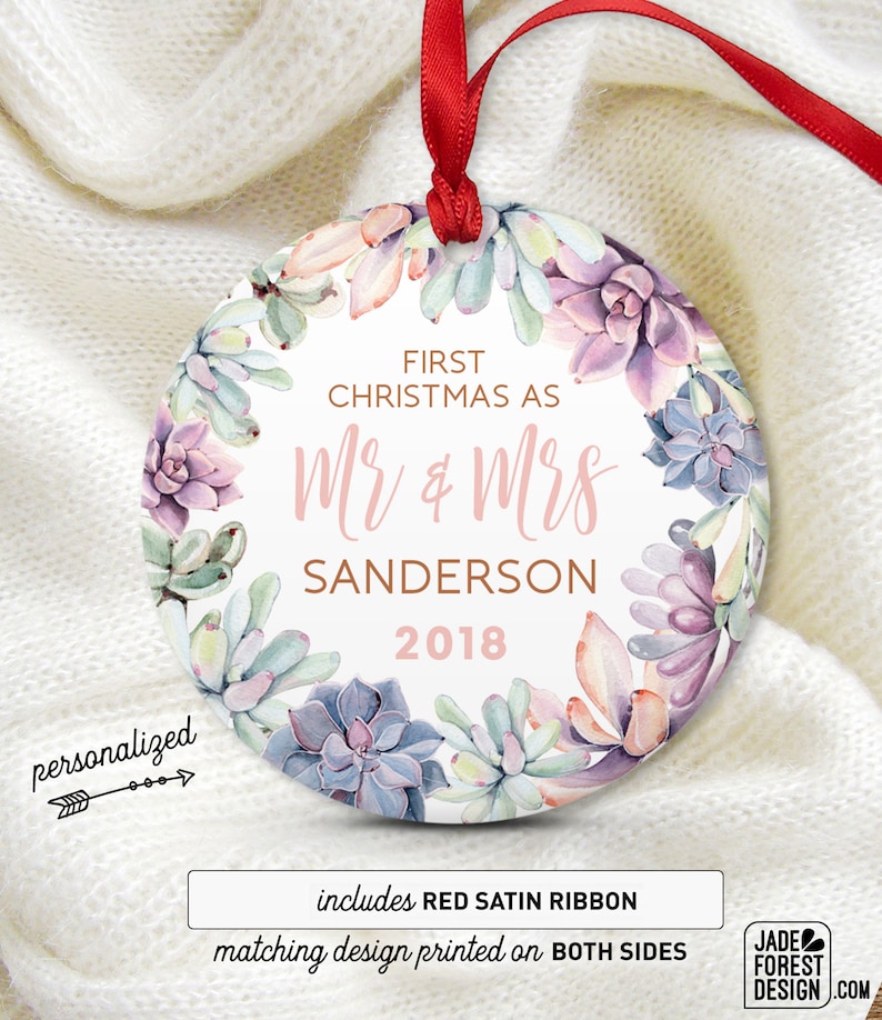 a christmas ornament with a floral design on it