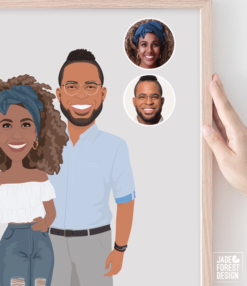 May include: A framed illustration featuring a couple and two circular portraits. The couple is depicted in a cartoon style, with the woman wearing a white off-the-shoulder top and jeans, and the man in a light blue shirt and gray pants. The portraits show the couple's faces. The frame is light wood.
