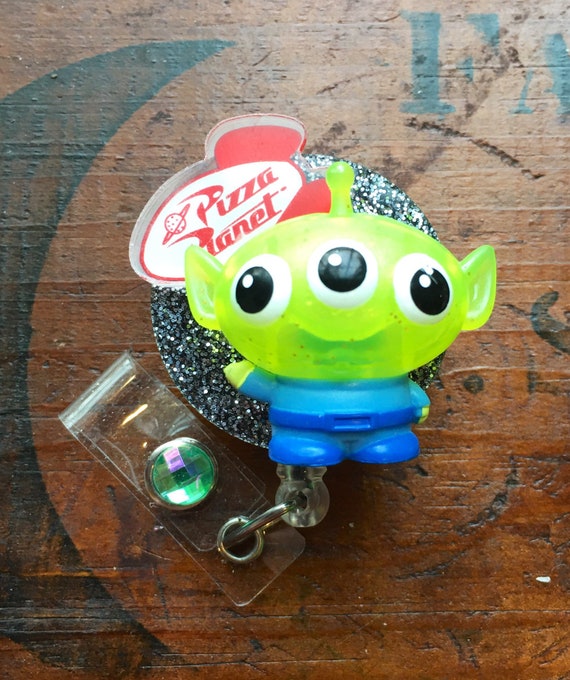Toy Story Translucent Alien' Pizza Planet ID Badge Reel Weighs Approx 1oz.  -  Canada