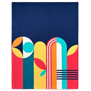 May include: A colourful geometric quilt with a navy blue background. The quilt features a design of overlapping circles, arches, and stripes in shades of red, yellow, orange, white, and turquoise.