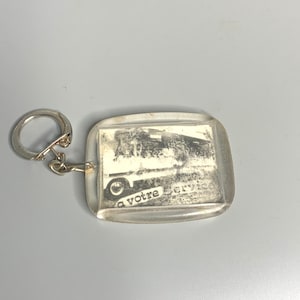 French vintage keychain holder advertising butter and cheese local shop Lucite