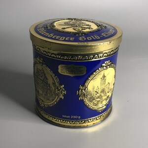 German vintage tin can box advertising Nuernberger lebkuchen cookies displaying different castles