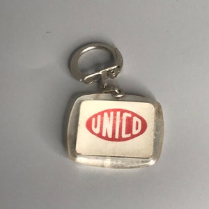 French vintage keychain holder advertising Unico lucite porte clef