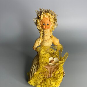 French vintage seashell sleeping doll in golden color dress Victorian style shell doll