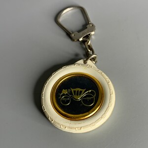 French vintage keychain holder advertising St Quentin ambulance ocal business tire shape