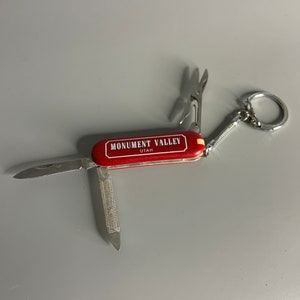 Vintage keychain holder knife advertising Monument Valley Utah pocket knife with handy tools souvenir