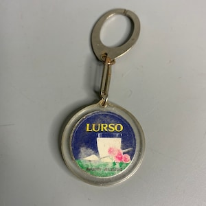 Französischer Vintage-Schlüsselanhänger mit Werbung für Lurso Le Mont Blanc Lait Milk