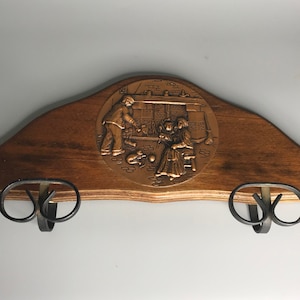 French vintage  wooden coat hanger and 2 iron hooks with copper scenery old couple by the fireplace