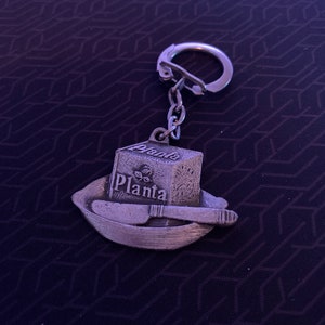 French vintage key chain holder advertising Planta butter porte clef Planta beurre