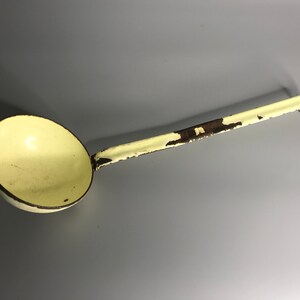 French vintage yellow enamel soup ladle