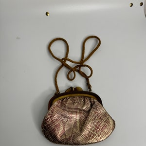Bolso de noche vintage de piel sintética de serpiente con asa estilo baquelita