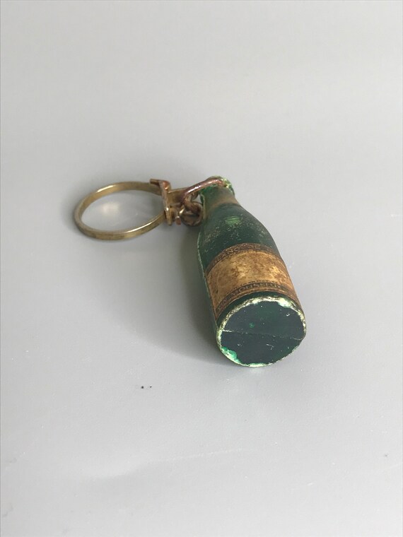 French vintage bottle design keychain holder advertis… Gem