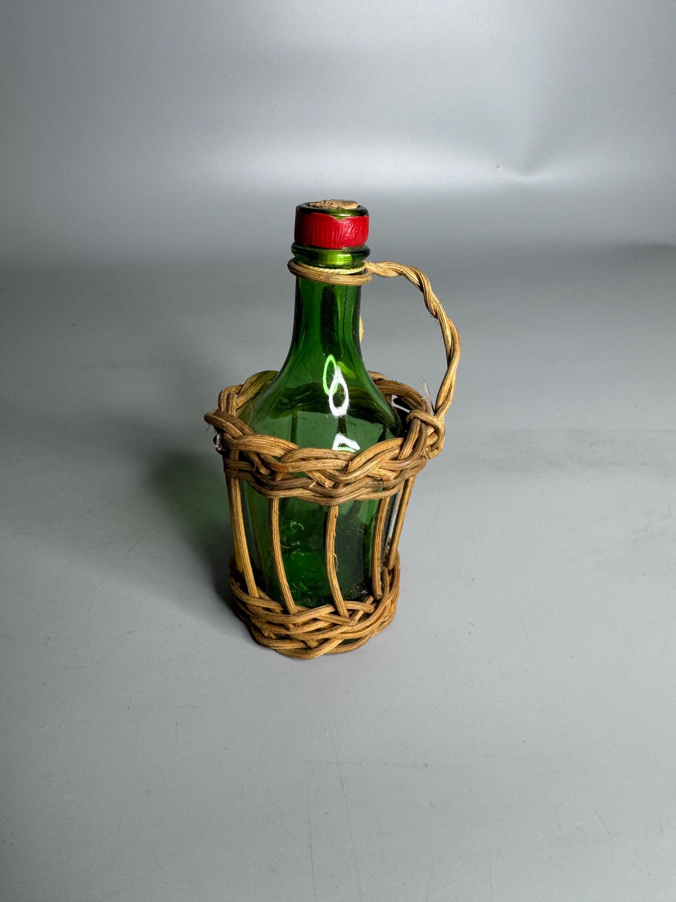 German vintage small decorative bottle Burgbrennerei in wicker basket collectible