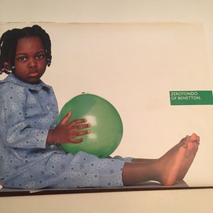 Italian advertising support Zerotondo Benetton children  printed Italy 1996 photo Toscani