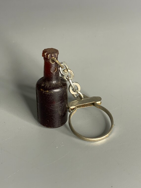 French vintage keychain holder advertising Pelfor… - image 3