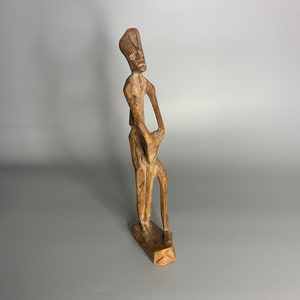 vintage wooden figurine statuette walking man design