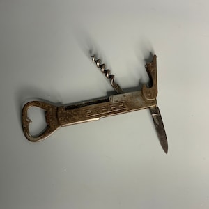 French vintage corkscrew bottle opener Byrrh knife aperitif