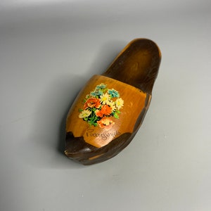 vintage wooden clog shoe decoration Pierrefonds souvenir castle wall hanging shoe