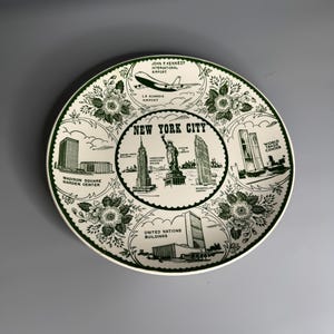 Vintage ceramic pottery decorative plate New York City locations souvenir Liberty statue -World trade center and more