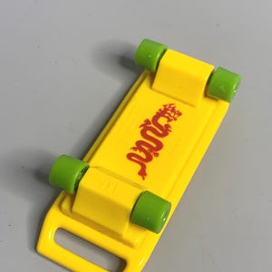 French vintage McDonalds collectible toy Disney skateboard