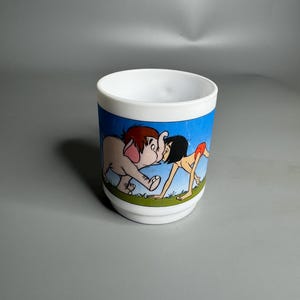 Francuski zabytkowy ceramiczny kubek porcelanowy Disney - Nesle Smarties kolekcjonerskie kubki z kreskówkowym wzorem