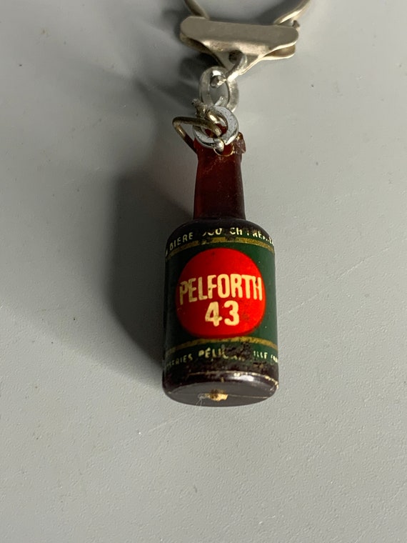 French vintage keychain holder advertising Pelfor… - image 5