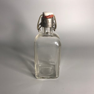 French vintage A.L. marque deposee square bottle with porcelain lid