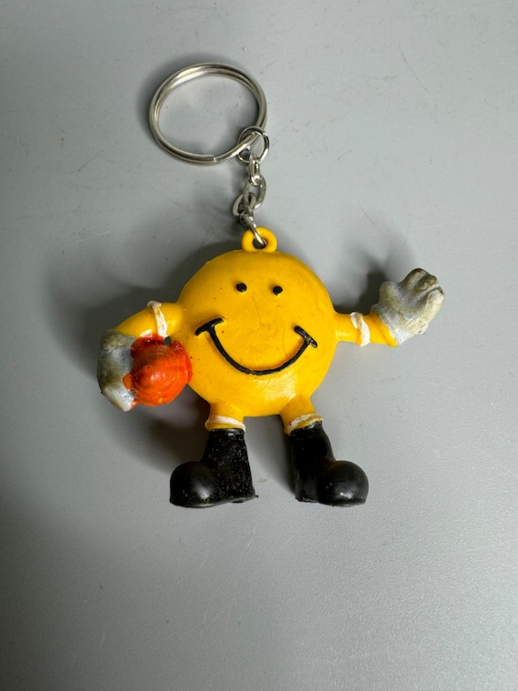 French vintage keychain holder advertising smiley face