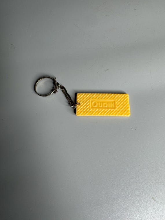 French vintage keychain holder advertising Oudin