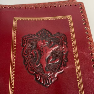 Libreta vintage francesa de tapa dura con diseño de león y cubierta de papel de carta con apariencia de cuero