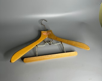 French vintage wooden coat hanger advertising Nancya with pants holder