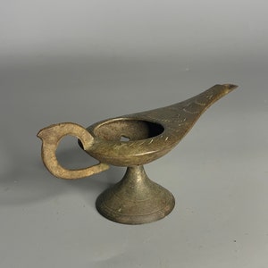 French vintage brass color metal genie lamp probably candle stick holder