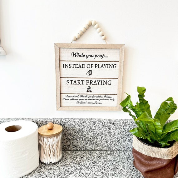Funny Bathroom Sign: Praying Instead of Playing - Laser Engraved Wood