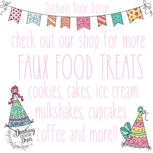 Puede incluir: Un cartel rosa y blanco con el texto "Dashing Door Decor" y "check out our shop for more FAUX FOOD TREATS cookies, cakes, ice cream milkshakes, cupcakes coffee and more!!" El cartel est&aacute; decorado con sombreros de fiesta y una guirnalda de banderines coloridos.