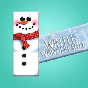 Könnte beinhalten: Eine weiße Schokoladentafel-Verpackung mit einem Schneemann-Design und dem Text "Winter Wonderland". Der Schneemann trägt einen roten Schal und eine Karottennase.