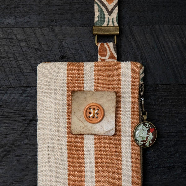 Southwestern style OOAK wristlet clutch bag, handmade in earthy tones of linen designer fabrics and coconut button. Ready to ship