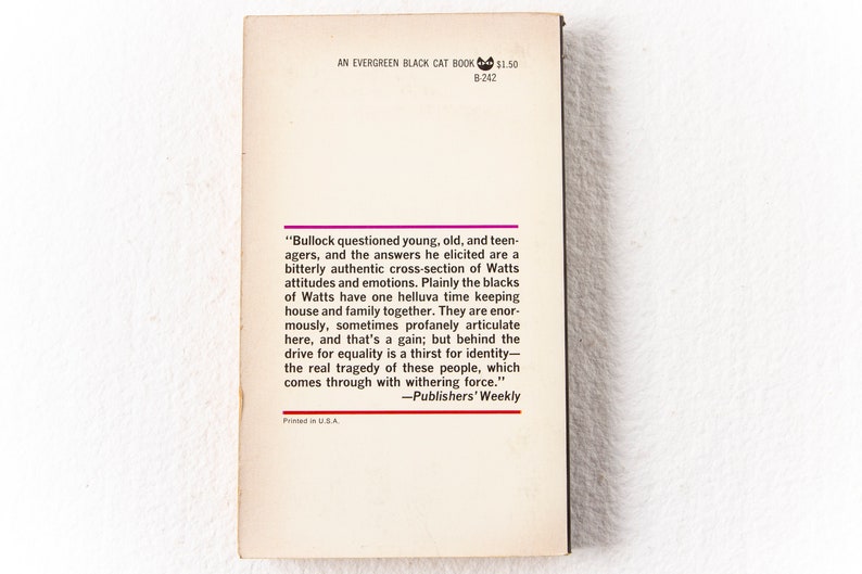 May include: A book cover with a black and white image of a cat. The text on the cover reads "An Evergreen Black Cat Book" and "B-242". The back cover features a quote from Publishers' Weekly about the book.