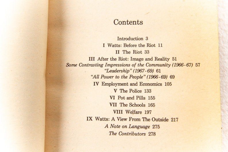May include: A book titled "Watts: The Aftermath" with a table of contents listing the chapters and page numbers. The chapters include "Introduction", "Before the Riot", "The Riot", "After the Riot: Image and Reality", "Some Contrasting Impressions of the Community", "Leadership", "All Power to the People", "Employment and Economics", "The Police", "Pot and Pills", "The Schools", "Welfare", "A View From The Outside", "A Note on Language", and "The Contributors".