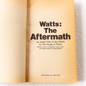 May include: A book titled "Watts: The Aftermath" by The People of Watts. The book is about an inside view of the ghetto. It was edited with an introduction, notes, and a concluding chapter by Paul Bullock. The book was published by Grove Press, Inc. in New York.