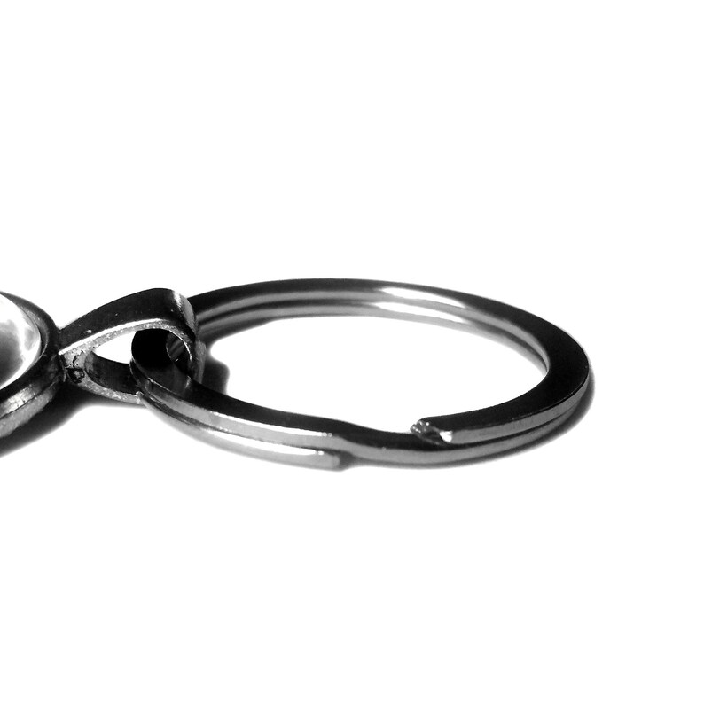 Isaiah 40:31 But they that wait upon the LORD shall renew their strength. King James Version KJV Bible Keychain Keyring