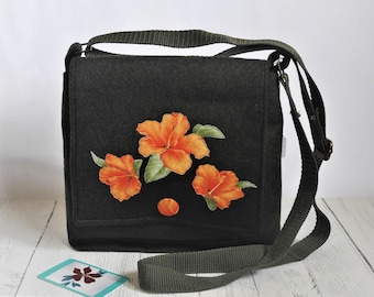 Crossbody messenger bag with orange floral design