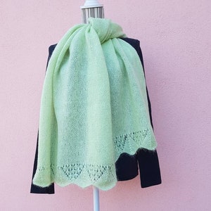 Acid green knitted stole with finishing edge.