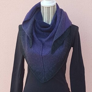 Purple to black gradient triangular knitted scarf.