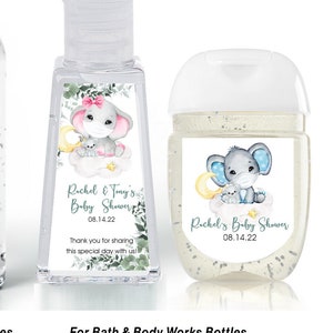 May include: Set of five hand sanitizer labels featuring a watercolor illustration of a baby elephant with a pink bow. The labels are designed for baby showers and include the text "Rachel & Tony's Baby Shower" and the date "08.14.22". The labels are available in different sizes for various hand sanitizer bottles.